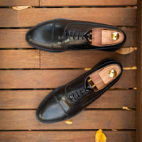 Black cap toe oxford shoe is classic and formal for business and wedding events