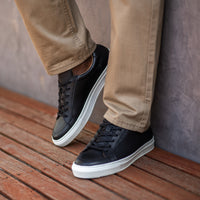 Smart ankle pants and striped te-shirts paired best leather sneakers mens