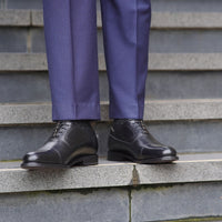 Black cap toe oxford shoes paired beautiful with 100% wool dress pant for corporate events and weddings