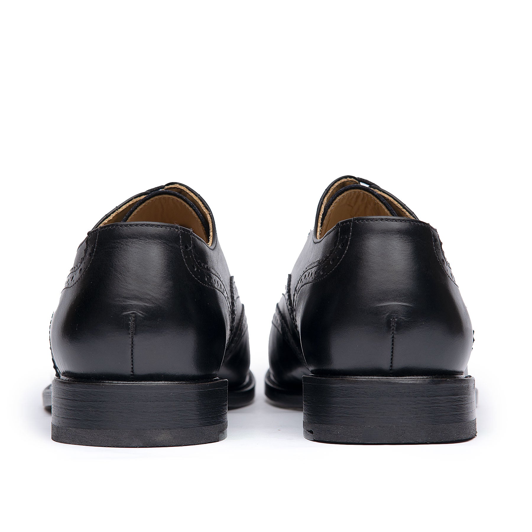 Black brogues shoes with stacked leather heel and rubber injection