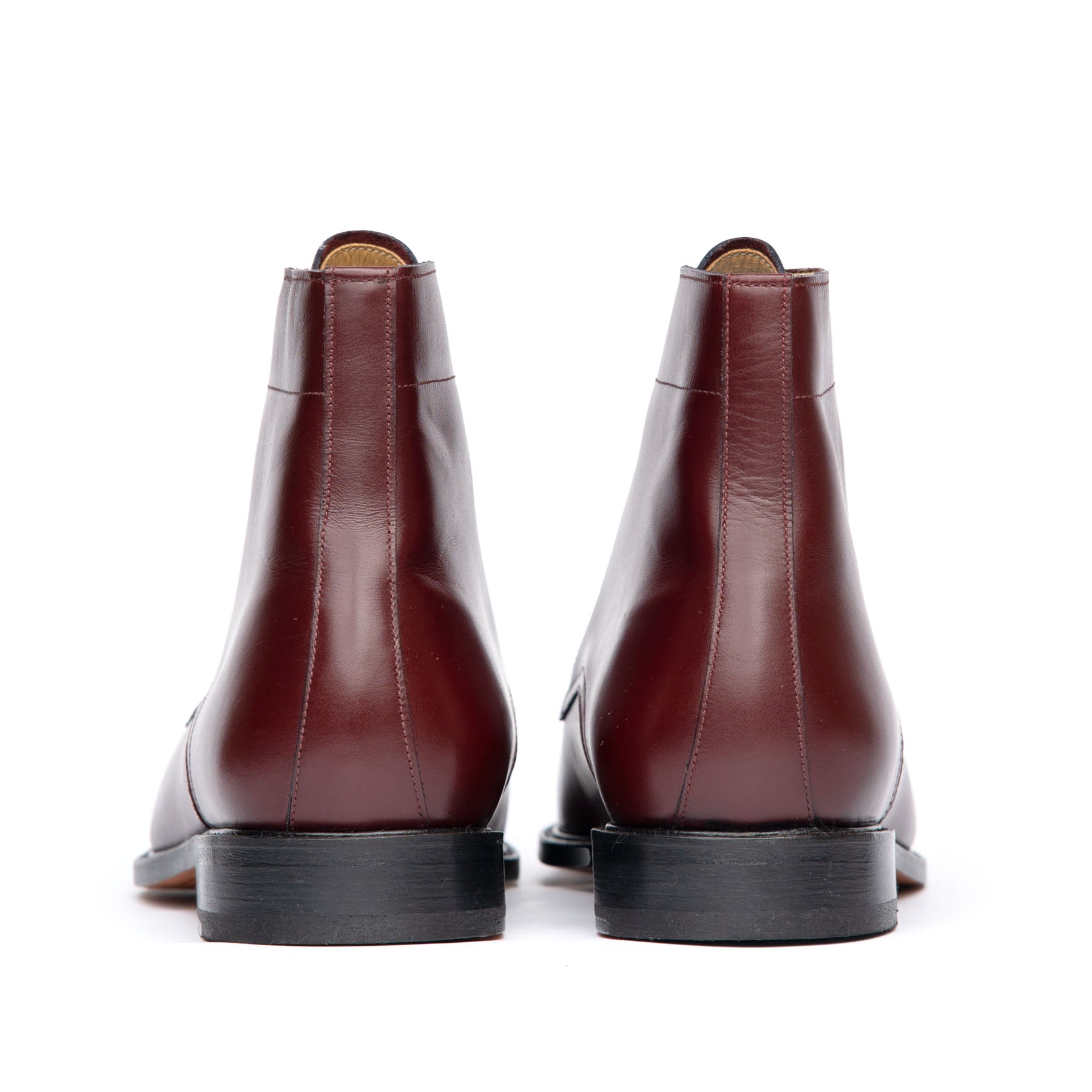 Burgundy dress boots with beautifully stacked leather heel and rubber injection for traction
