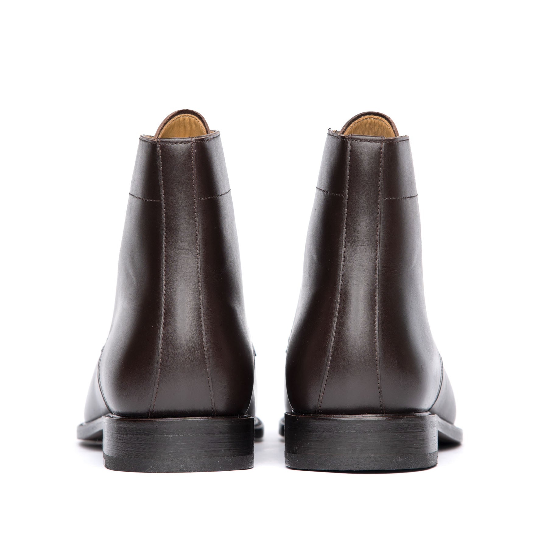Dark brown lace up boots with stacked leather heel and handcrafted in Portugal