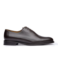 Dark brown oxford shoes with wholecut design are ideal for both formal and casual outfits