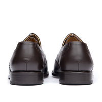 Mens brown brogue shoes with stacked leather heel and rubber injection for traction
