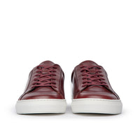 Mens casual low top sneakers expertly crafted using full grain leather in burgundy and rubber sole