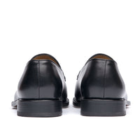 Mens tassel loafer in black leather with stacked leather heel
