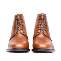Mens tan lace up boots with open lace system and hand polished for perfection