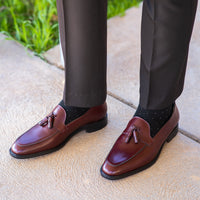 Burgundy tassel loafers, paired with black tailored dress pant and 100% cotton socks