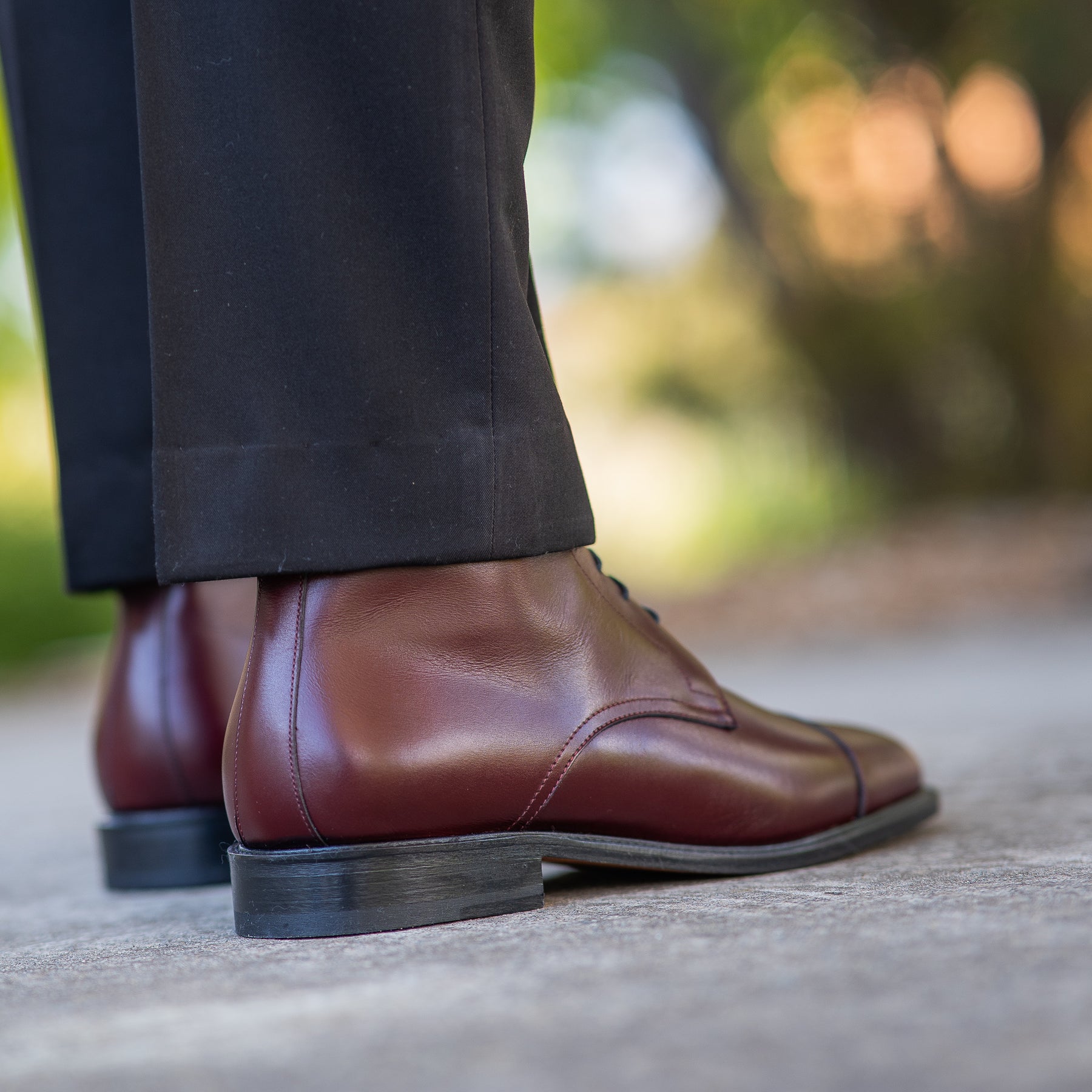 Shop mens boots crafted using full grain leather and styled with wool jacket for smart casual look