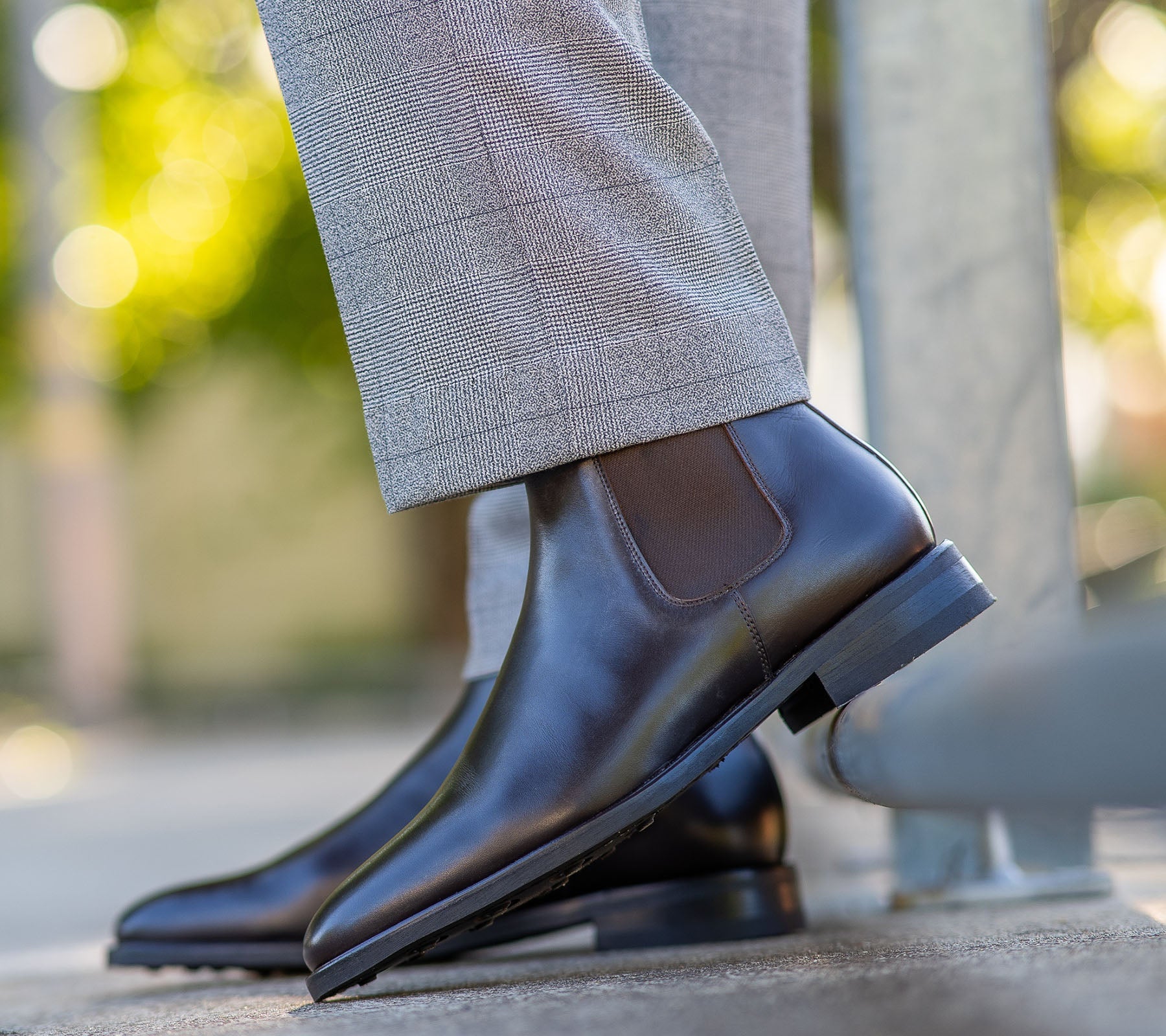 Mens chelsea boots worn wiith navy bespoke suit.