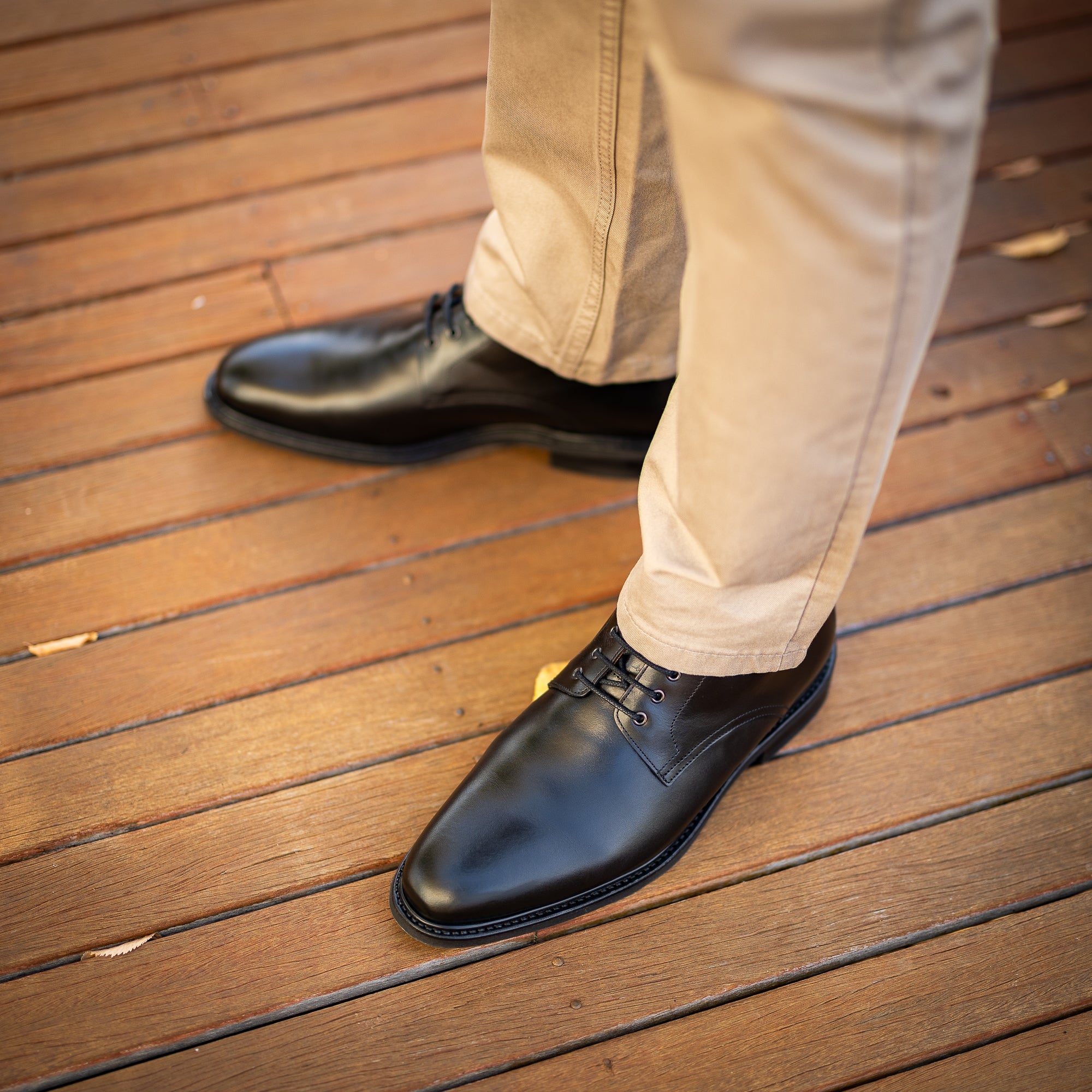 Dress black boots for men paired nicely with chinos for the weekend and casual days at the office