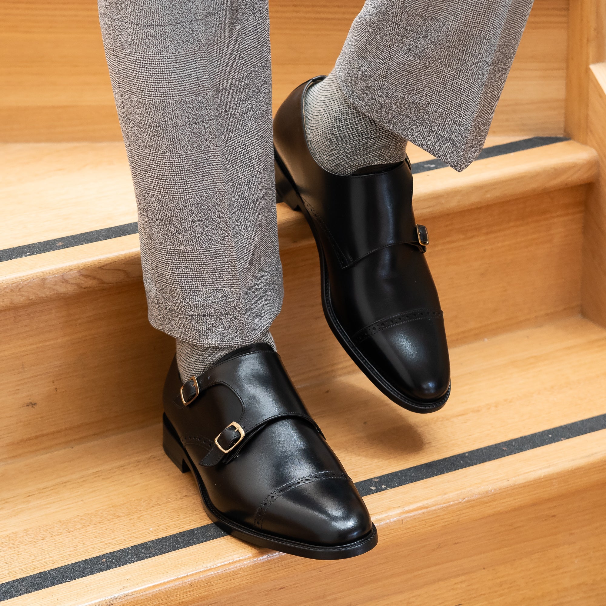 Double monk shoes paired nicely with stripped dress pants for the office