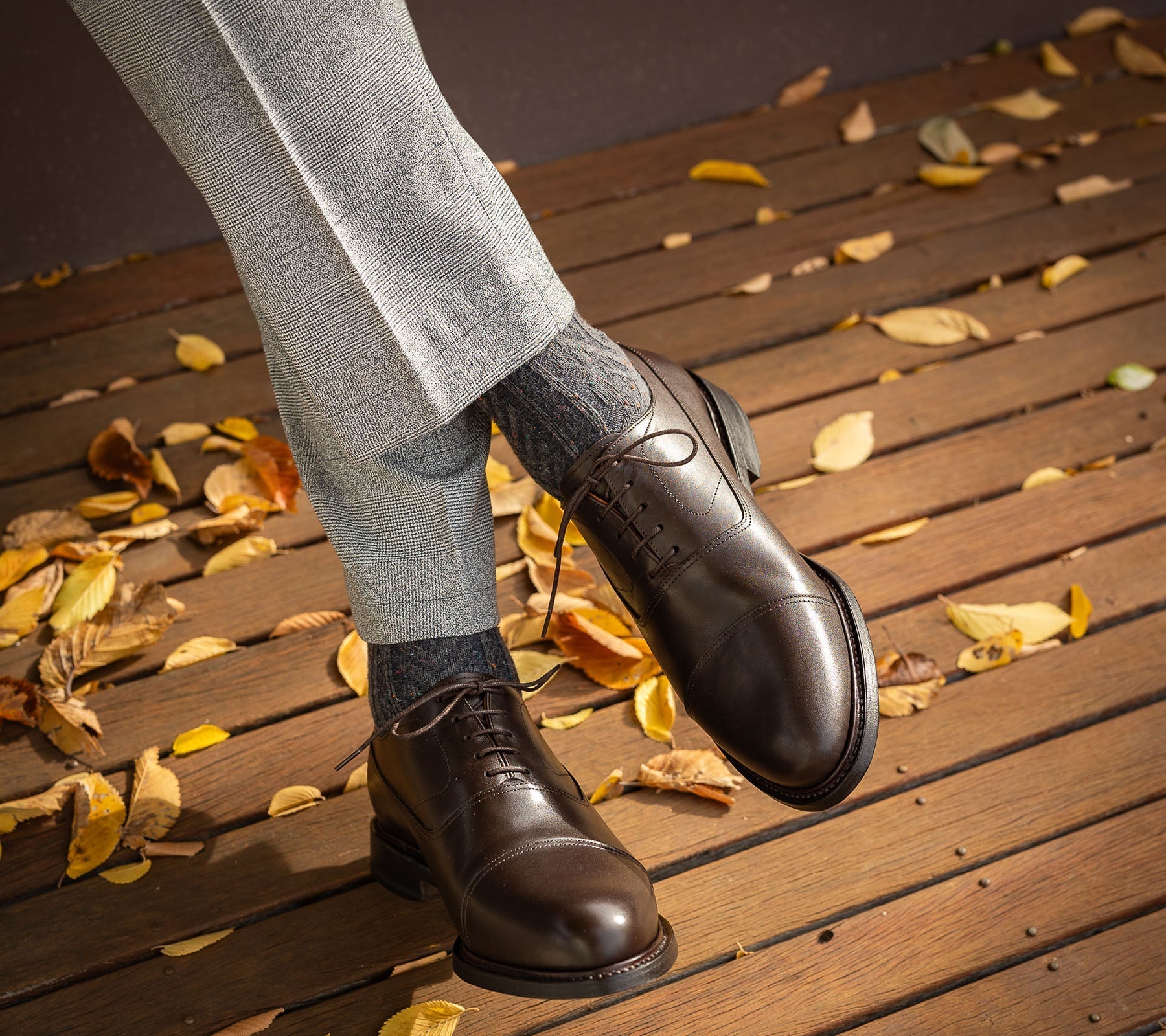 Brown leather oxford shoes complement formal outfit for special events