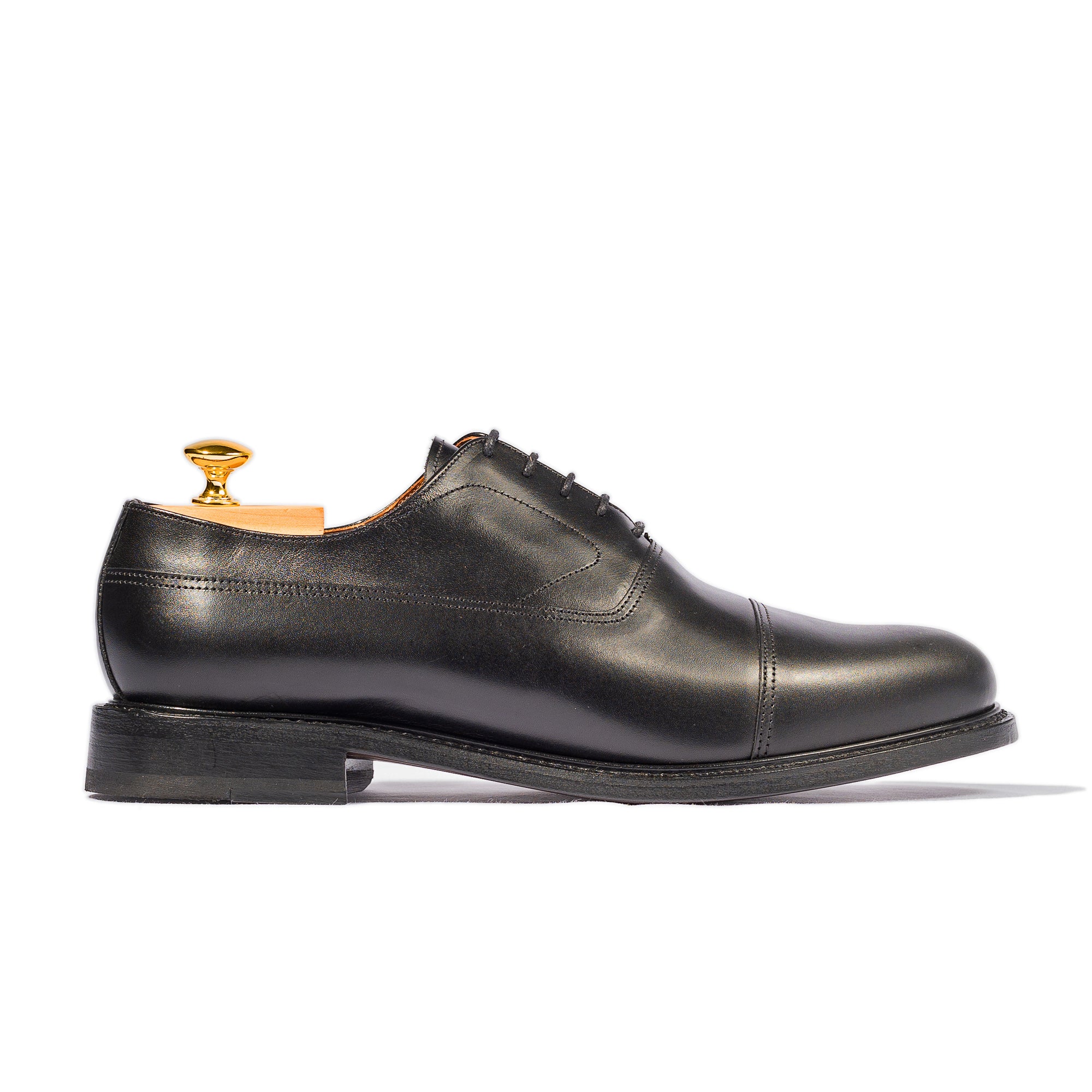 Black cap toe oxfords made in Portugal using full grain leather and goodyear welt