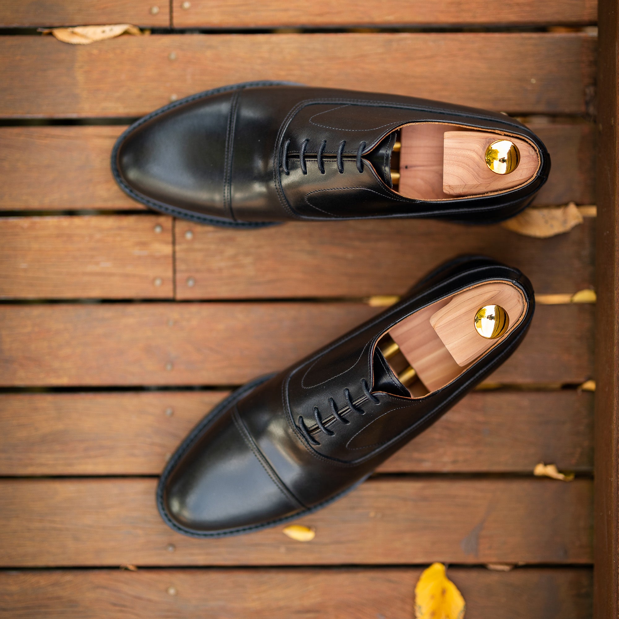 Black cap toe oxford shoe is classic and formal for business and wedding events 