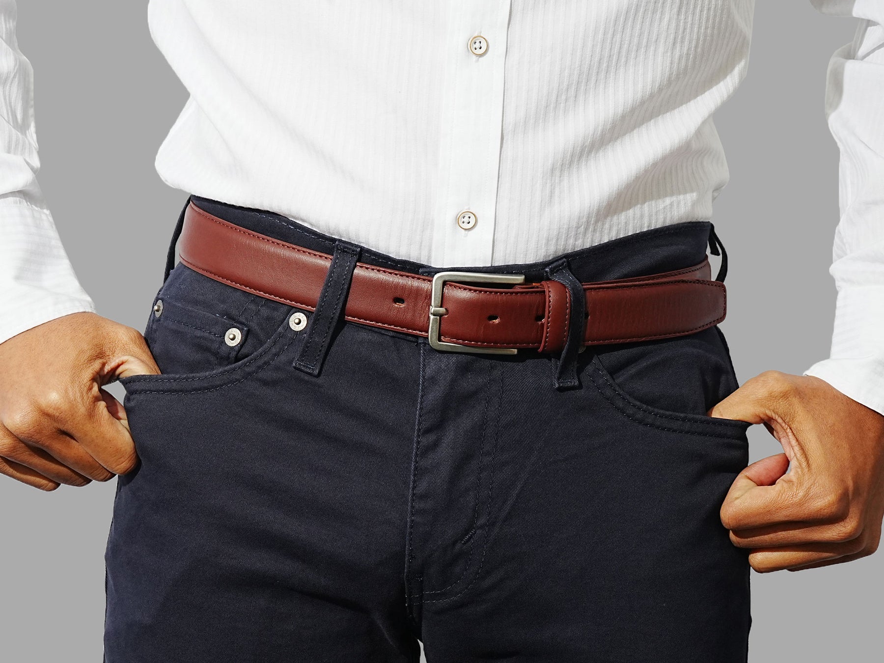 Premium burgundy dress belt. Perfect with tailored suits, formal pants, or slim trousers.
