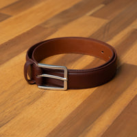 Burgundy leather belts for men. Sleek accessory for trousers, business, or weddings.