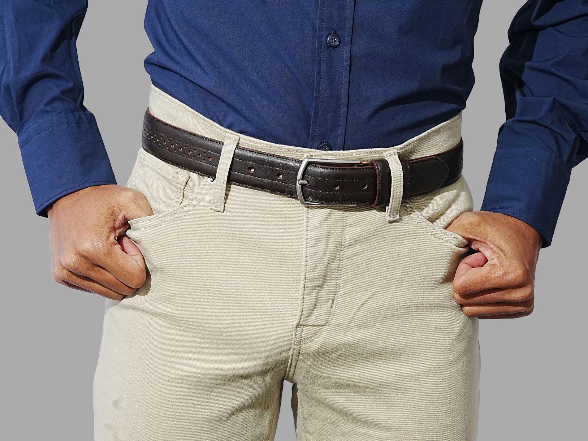 The essential brown belt for men. Crafted from full grain leather with brogues. Looks great with denim.