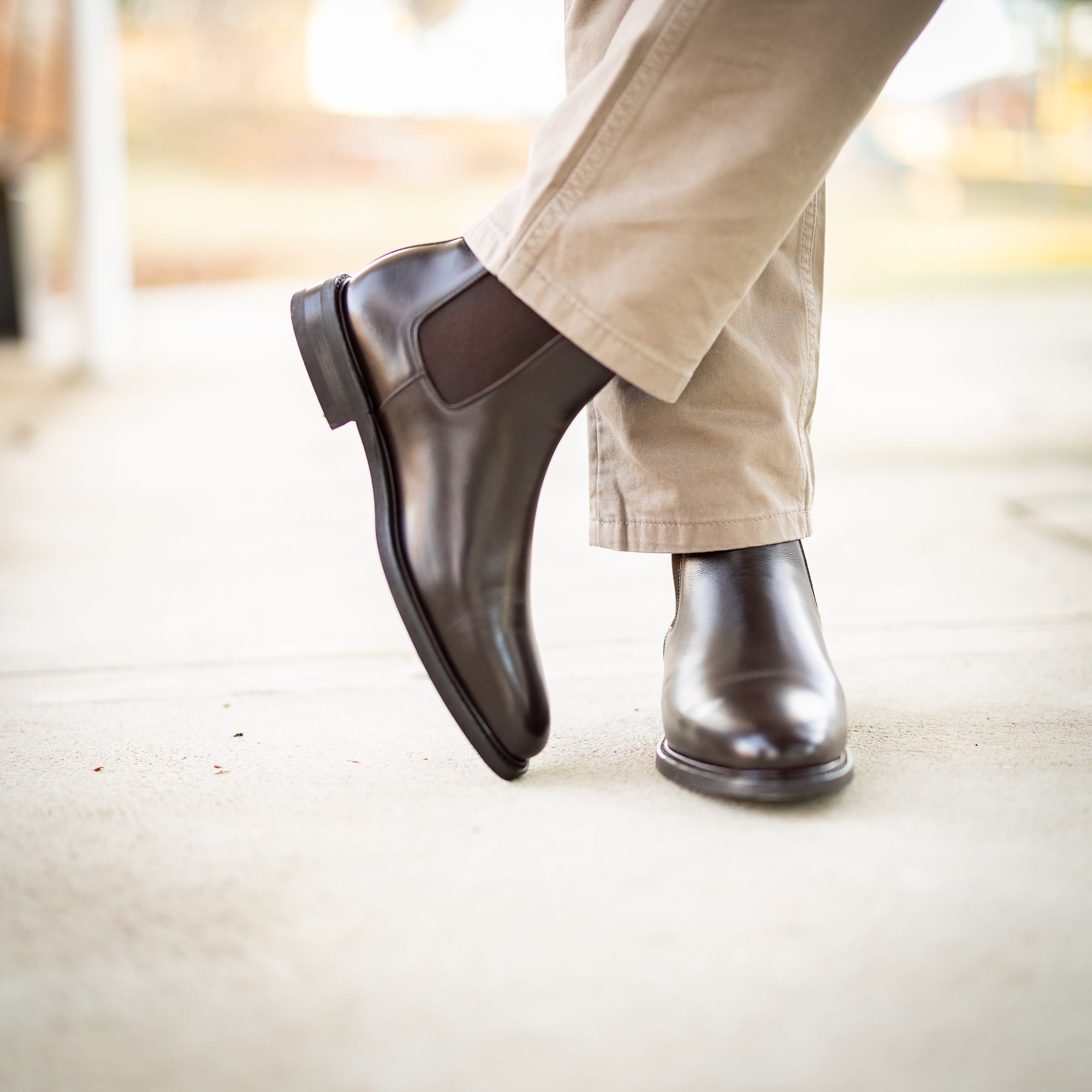 Men brown leather boots with wholecut design for everyday wear with all outfit types
