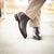 Men brown leather boots with wholecut design for everyday wear with all outfit types
