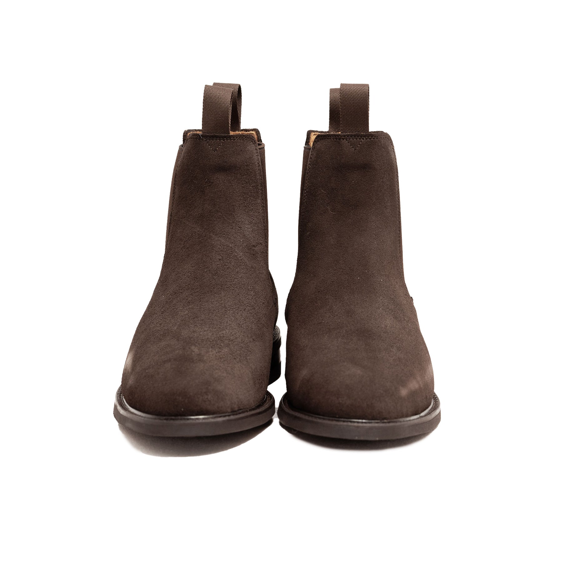 Brown suede chelsea boot featuring studded rubber sole for everyday wear in all seasons
