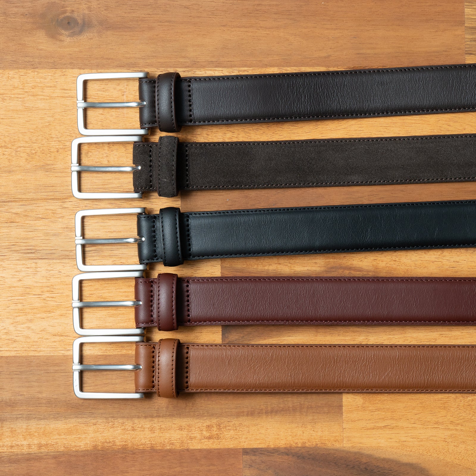 Mens dress belts made using full grain leather in multiple colors