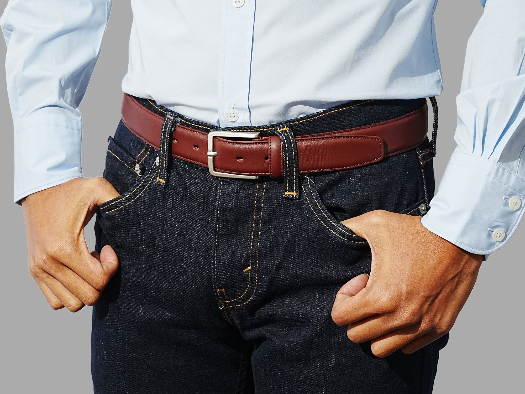 Men’s burgundy belt. A classic touch with suits, slim-fit pants, or polished trousers.