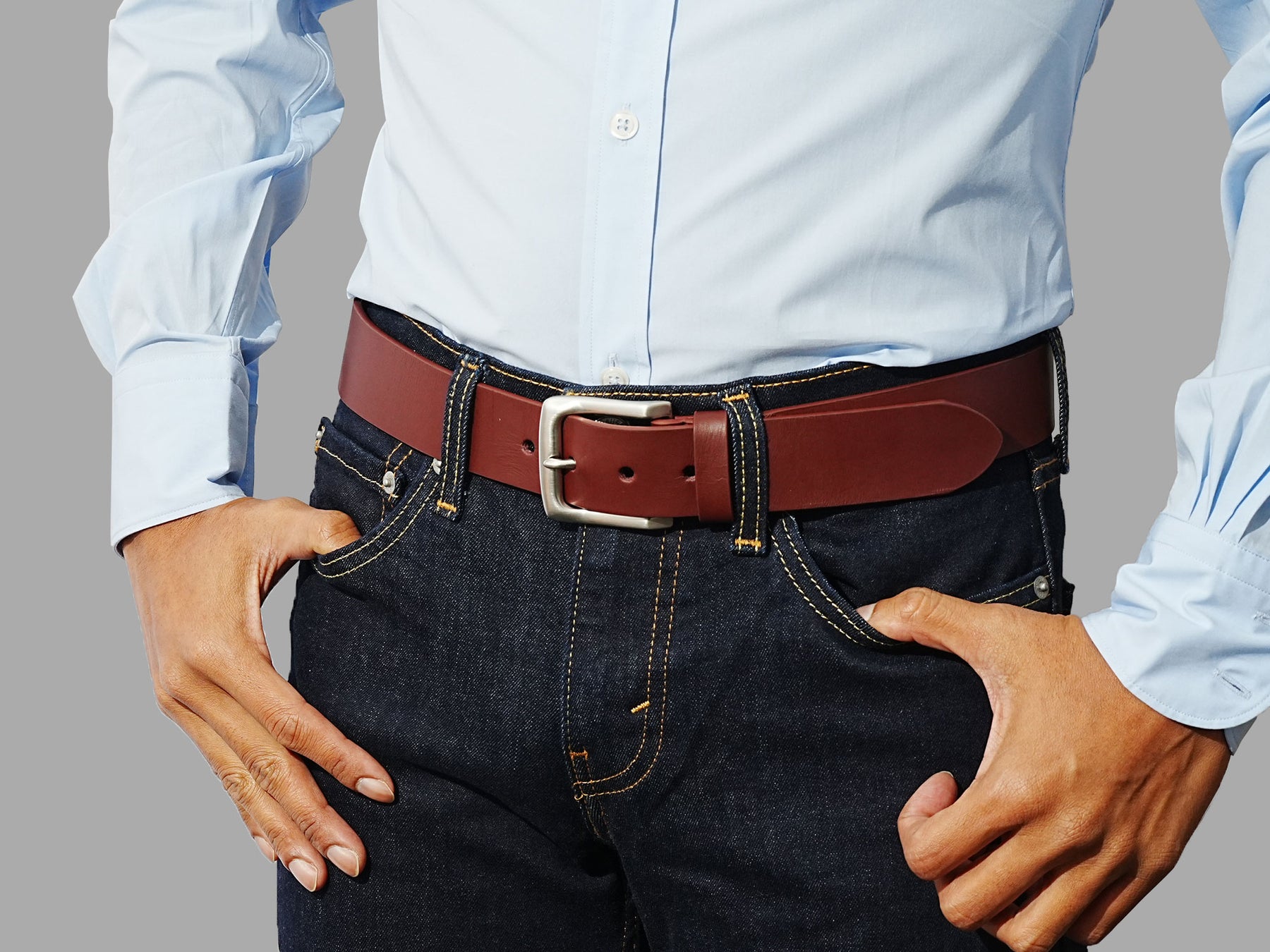 Men's casual belts in deep burgundy. The perfect color to add to your wardrobe.