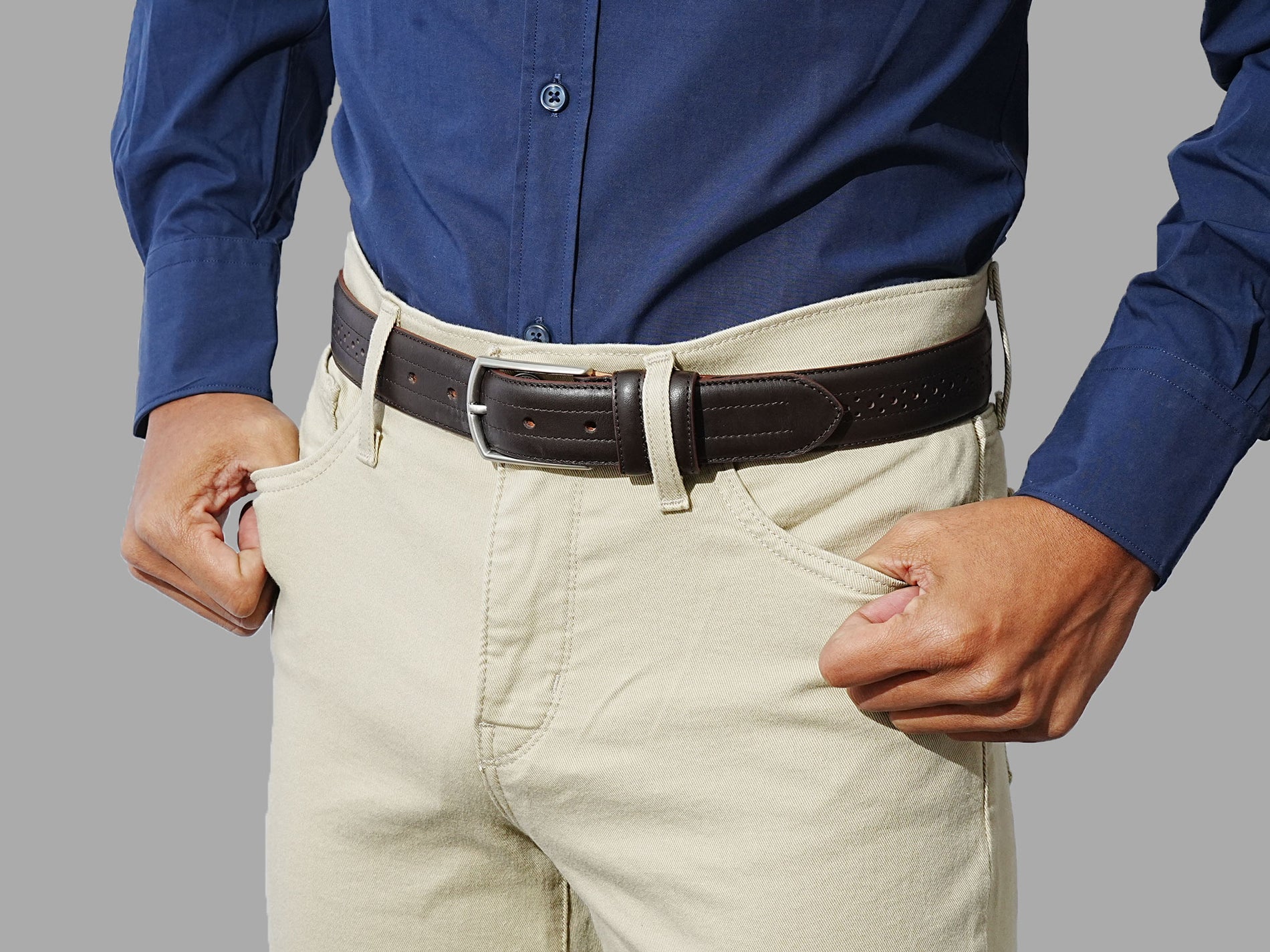Buy beautiful brogue belt. Made from calfskin that ages well. Wear with dress pants and formal shoes.