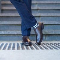 Mens brown oxford wholecut dress shoes made in Portugal using blake rapid stitched construction and paired with slim fit suit for weddings
