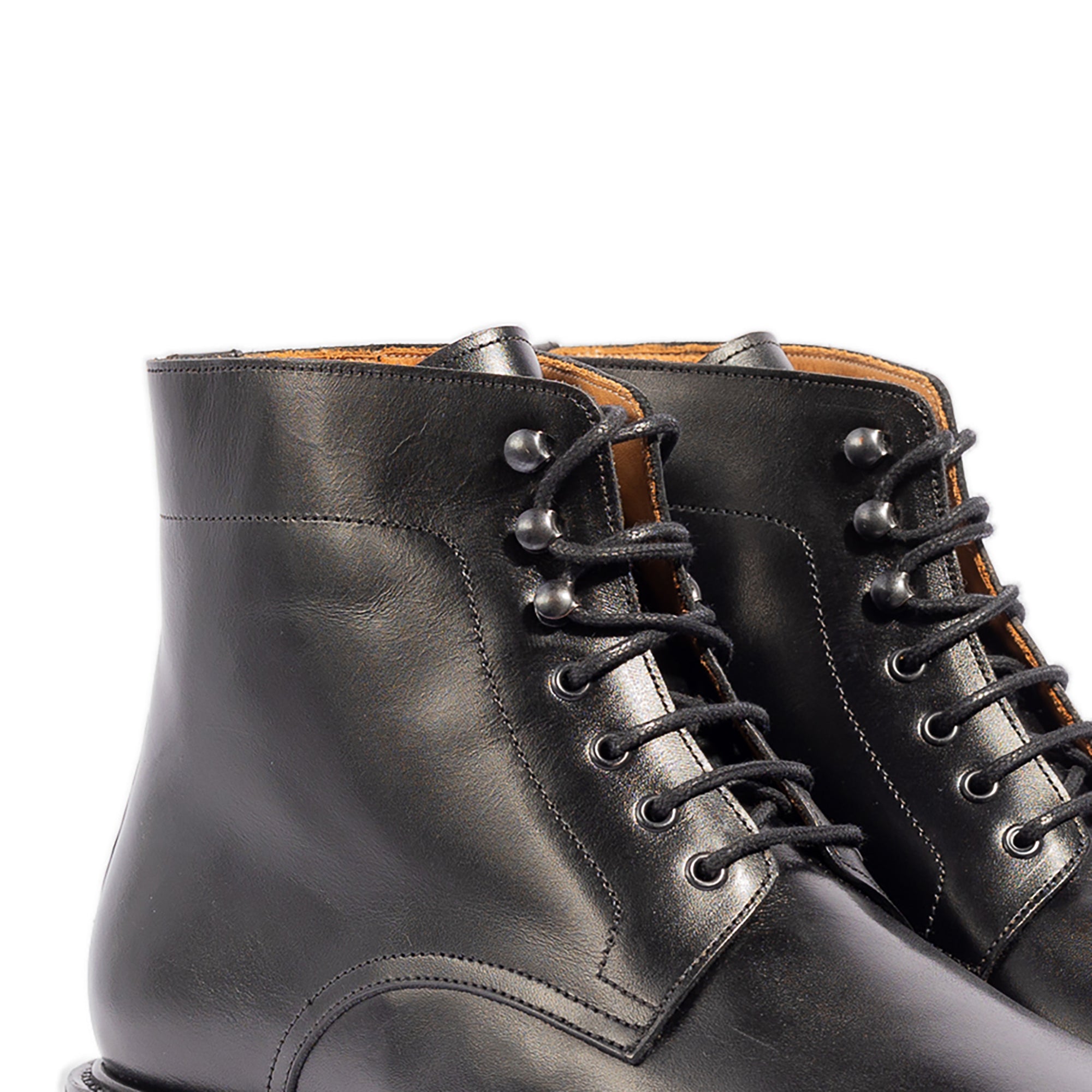 Mens leather lace up boots crafted using calfskin and lined for comfort