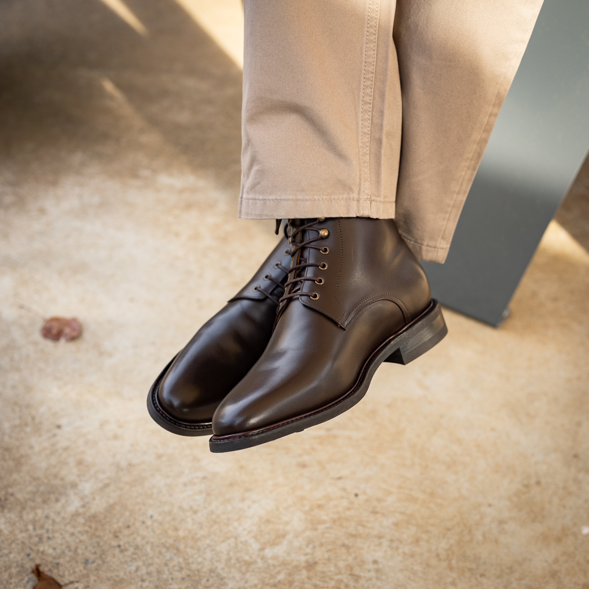 Men's lace up boots leather paired nicely with slim fit suit for weddings, office and business meetings