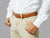 Tan leather belt with ornate perforations. Match with suits or smart 