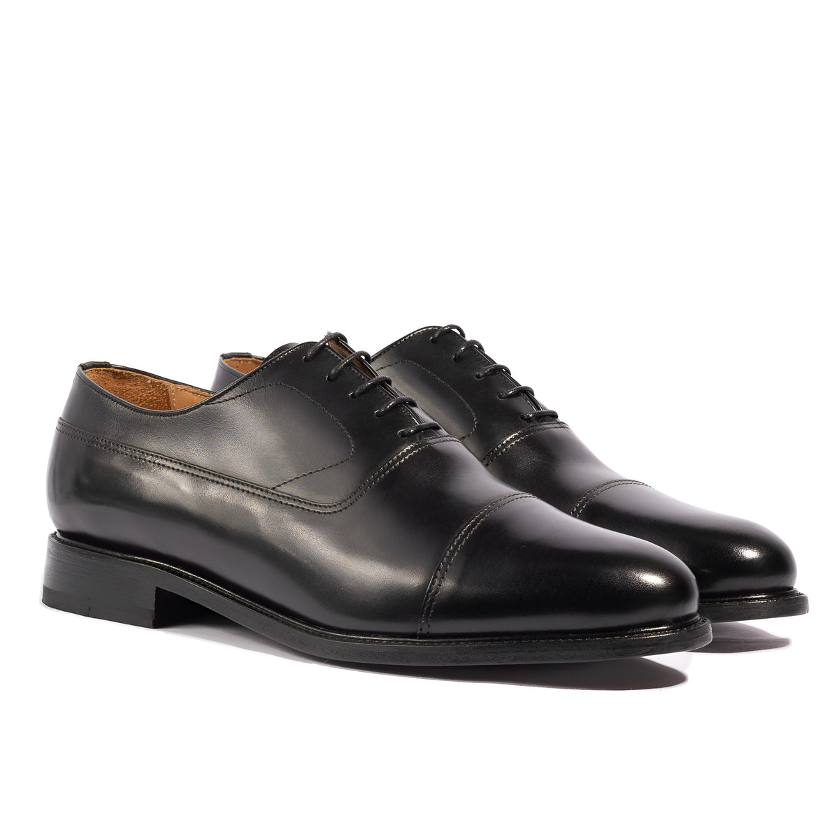 Oxford cap toe shoes crafted using blake rapid stitched construction and full grain leather for the upper