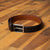 Women brown leather belt. Artisanal craftsmanship for a high-end feel. Style it with a suit.