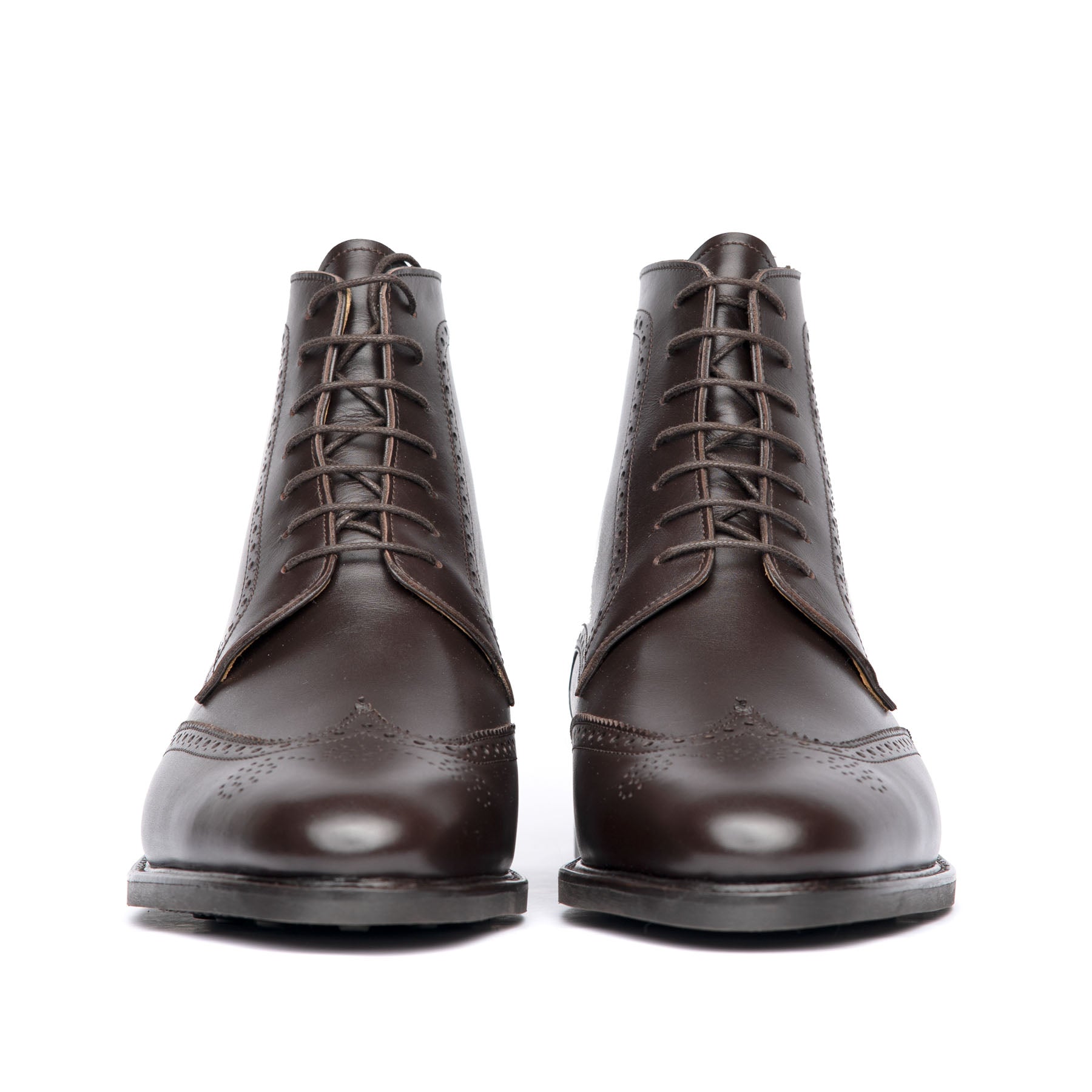 The Outback lace up boot in dark brown, versatile men choice for everyday wear with brogue perforation and 360 leather welt.