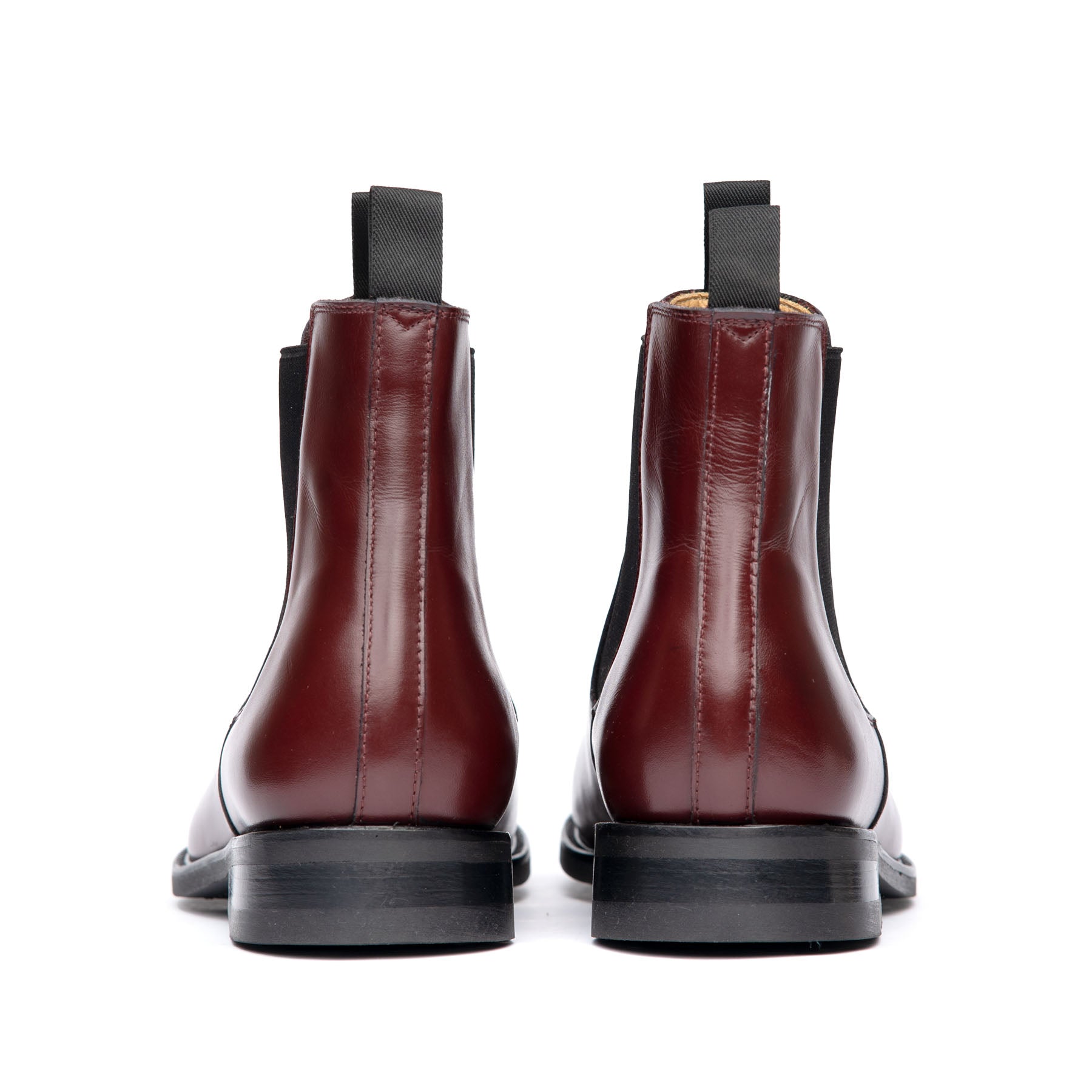 The Safari Chelsea boot in burgundy, loaded with natural leather heels and rubber pad.