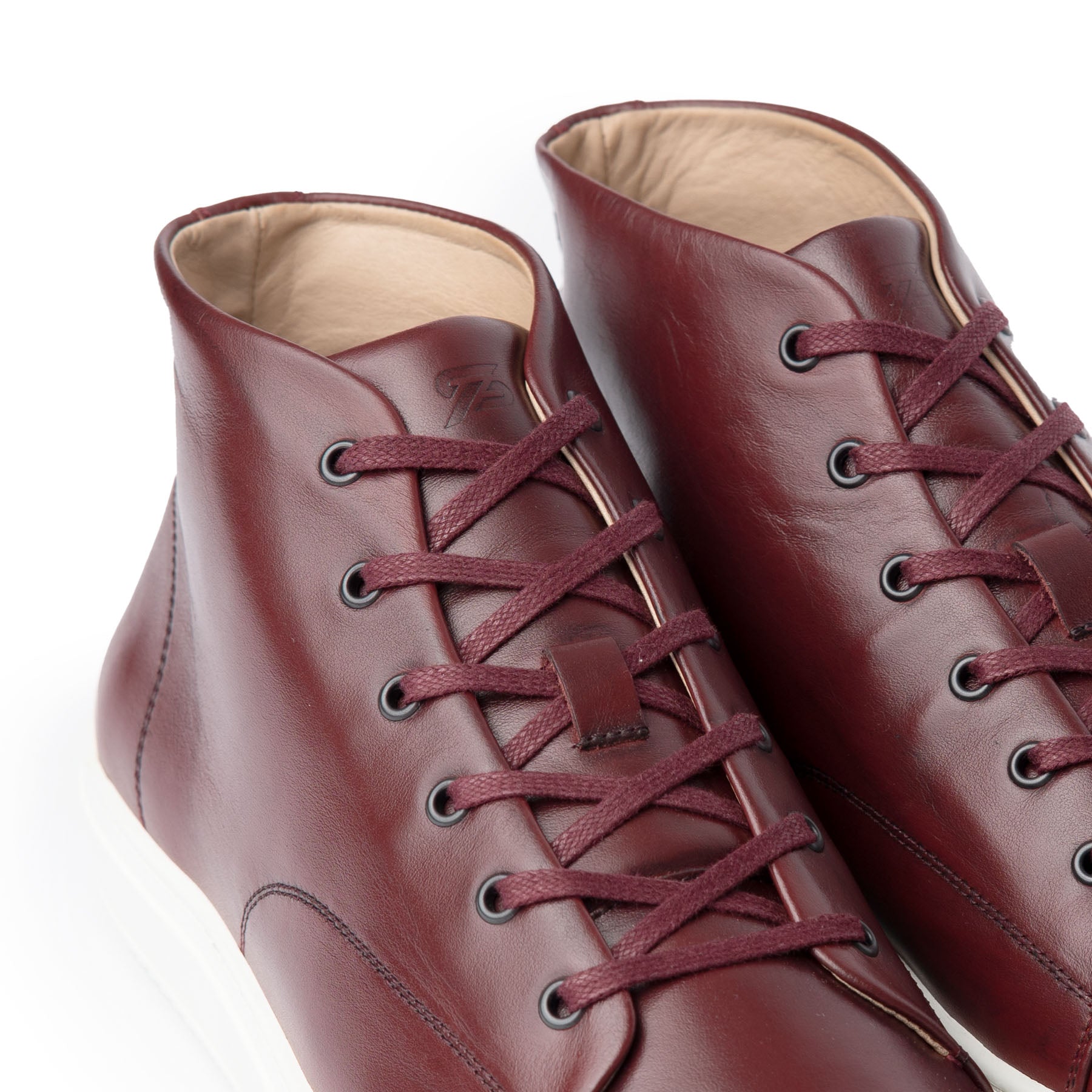 The Explorer hi-top sneakers in burgundy, finest full grain calfskin leather upper and lace up vamp