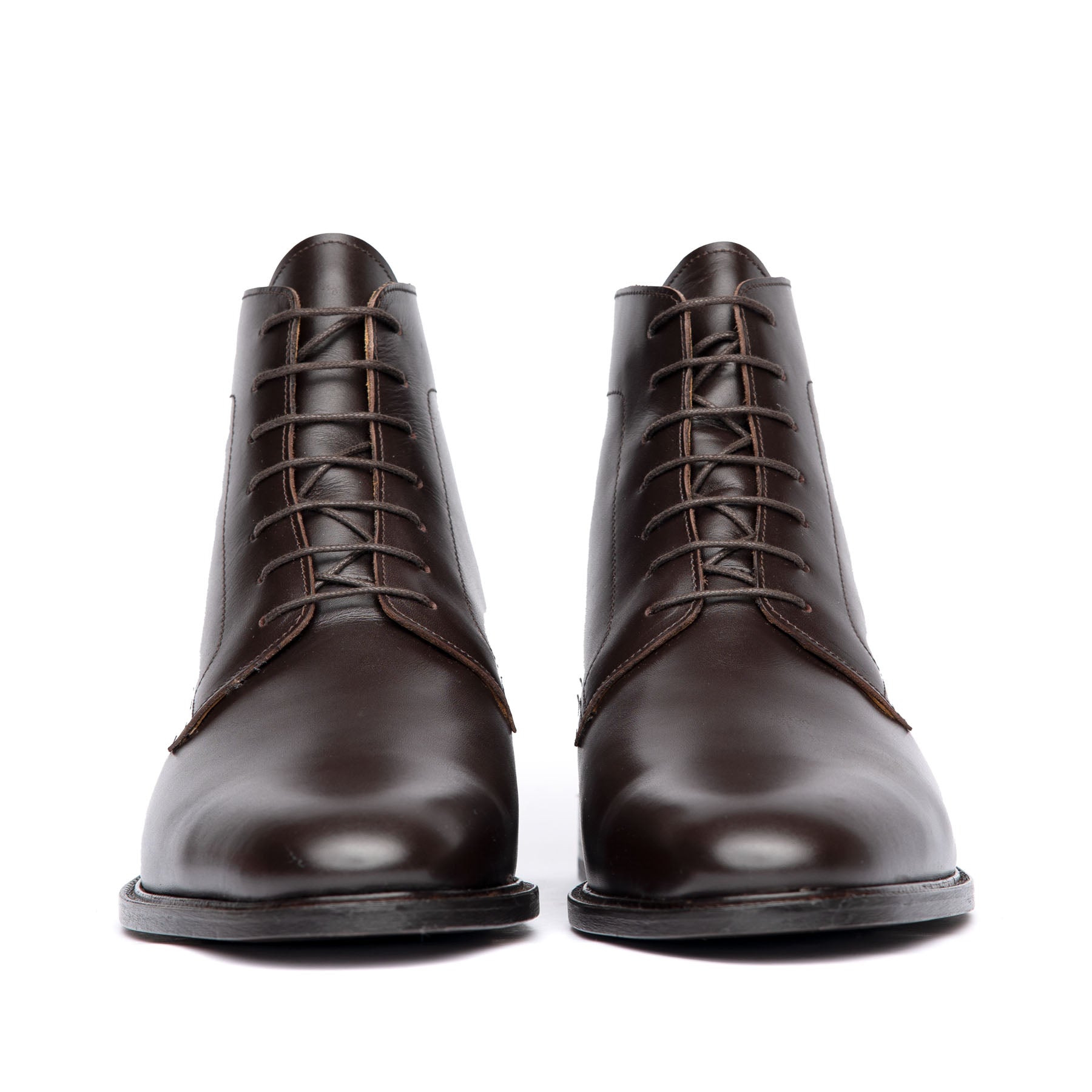 The Kingsman plain toe derby box calf leather boot in dark brown featuring almond toe and front lace fastening