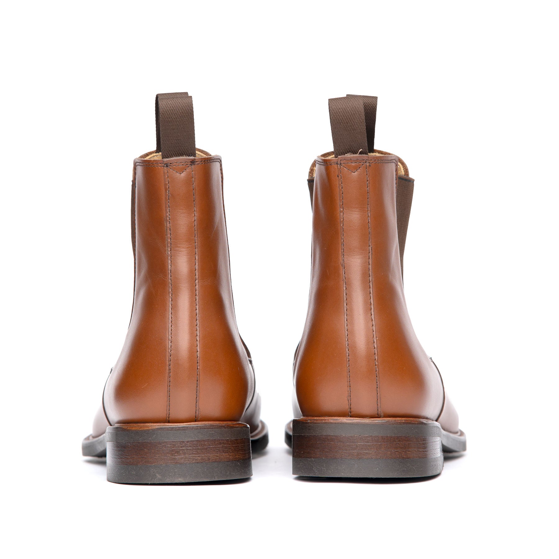 The Safari men’s Chelsea boot in cognac, loaded with natural cork, steel shank at the midsole and leather heel.