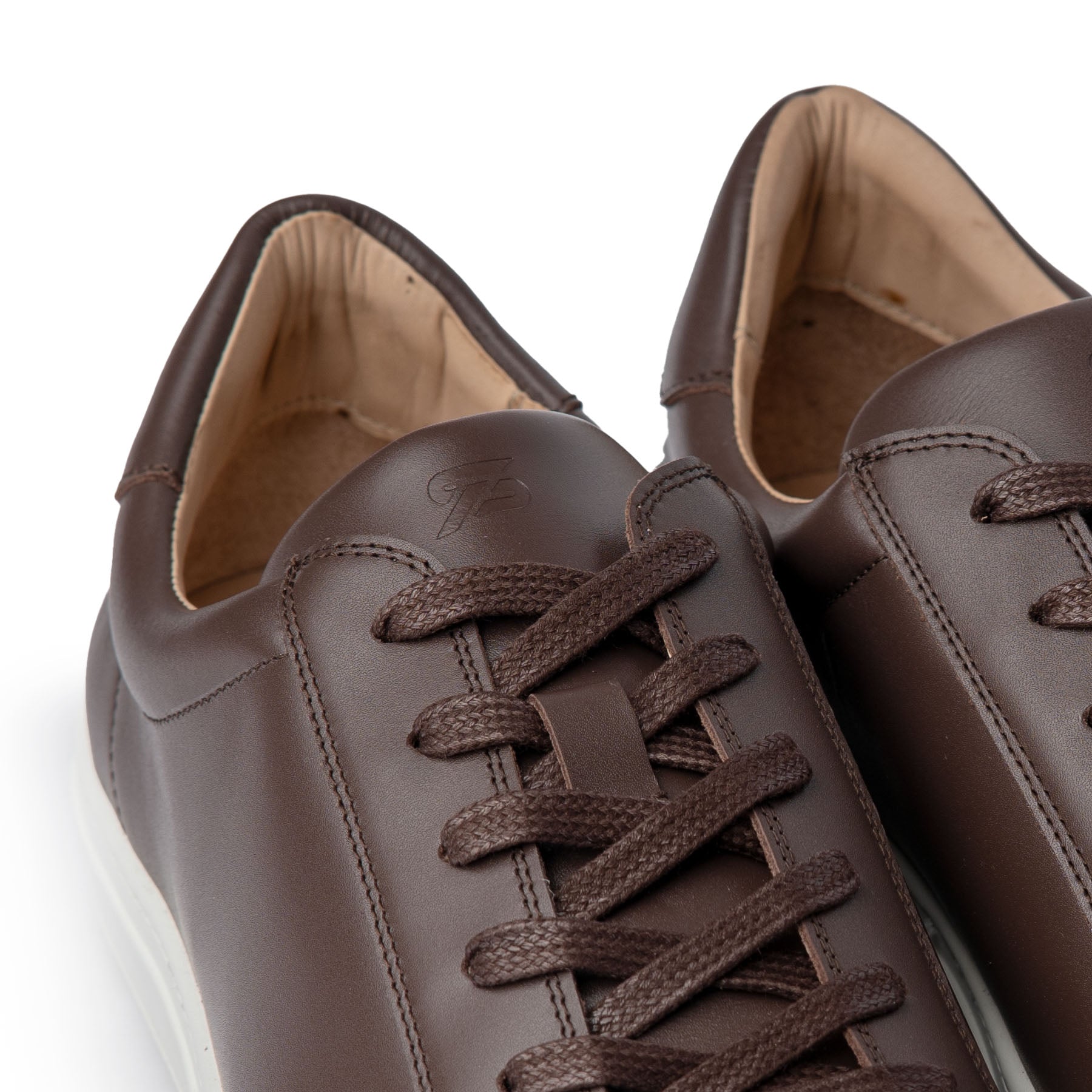 The Vin designer low top sneakers, made with smooth box calf leather with minimalistic design 