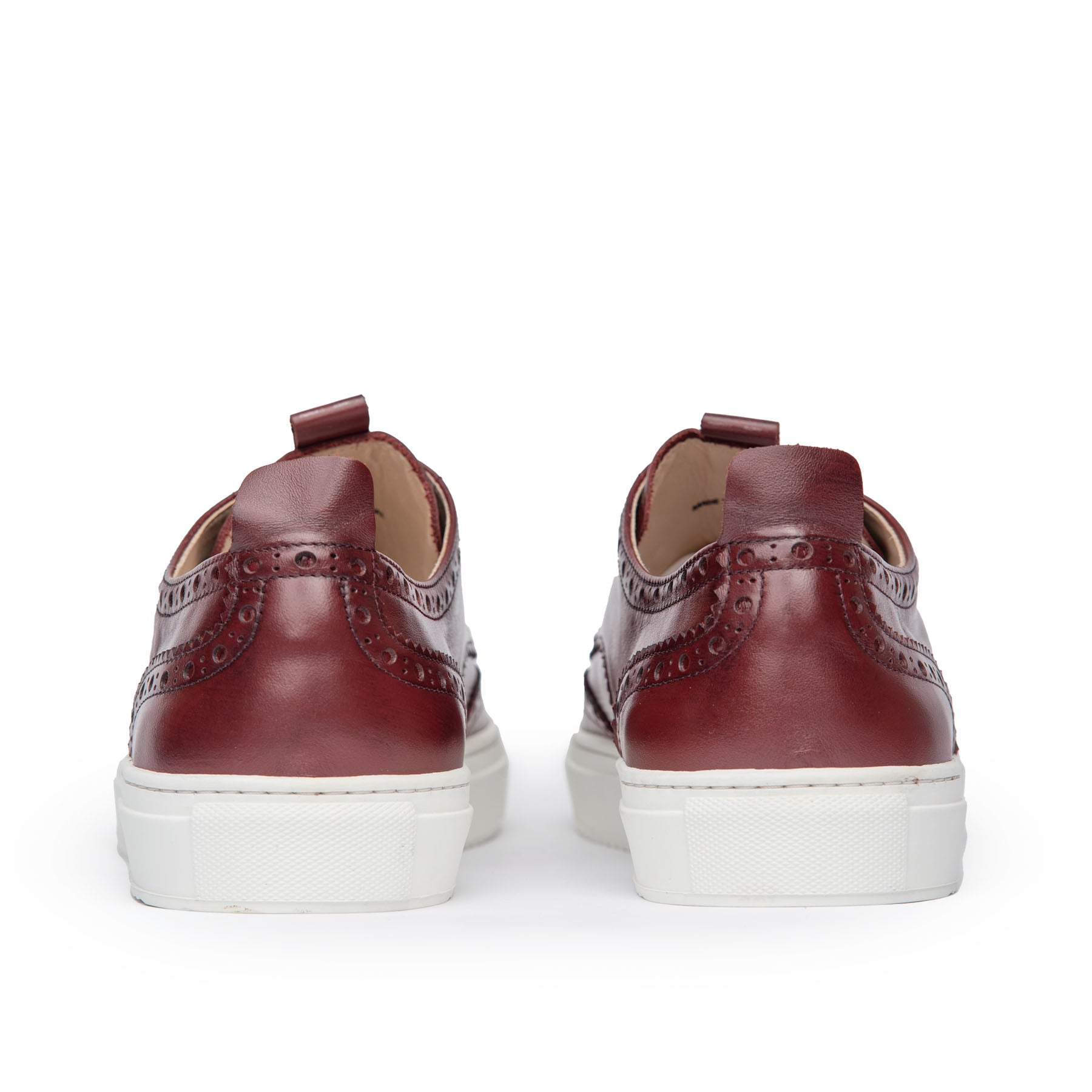 Men’s designer low top wingtip sneakers, the Explorer in burgundy with leather pull tab