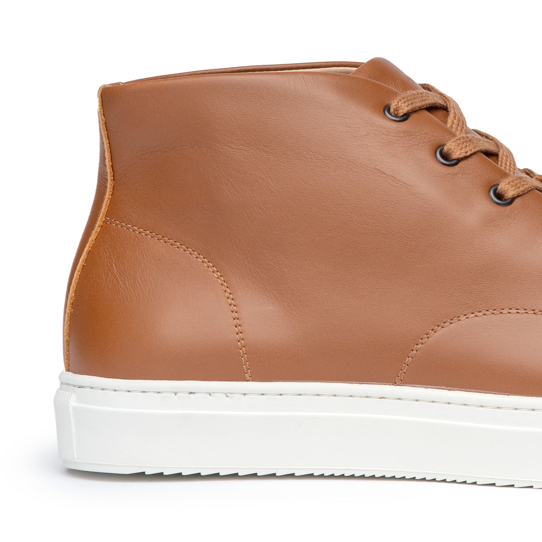 The Explorer hi-top in tan, fully lined with calfskin leather and 100% durable rubber sole