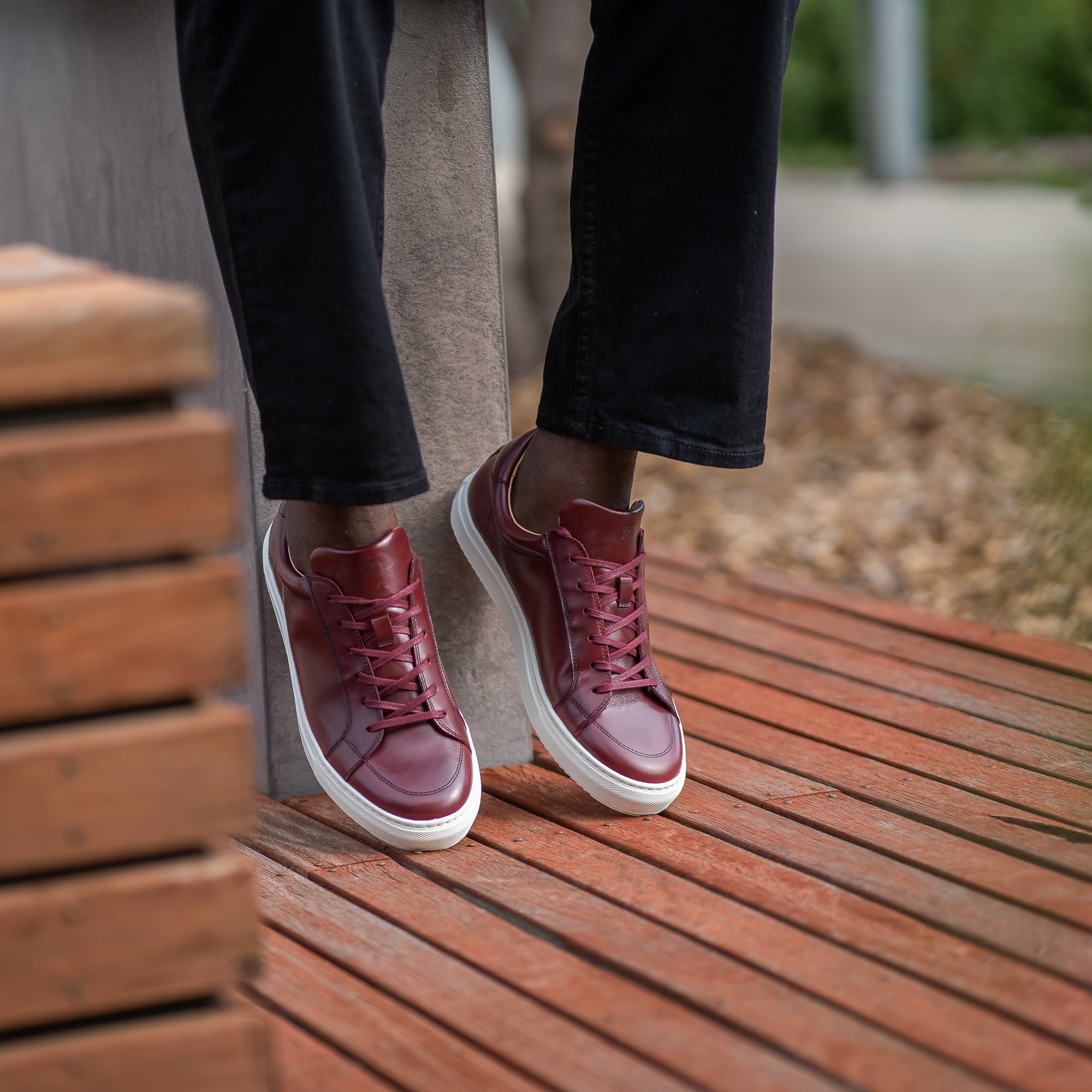 The Vin low-top designer sneakers in burgundy, classic and trendy worn with regular denim and polo shirts