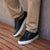 Smart ankle pants and striped te-shirts paired the Vin low top sneakers in black