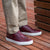 The Alpha brogue trainers in burgundy, styled with casual blazers and slim fit chinos.