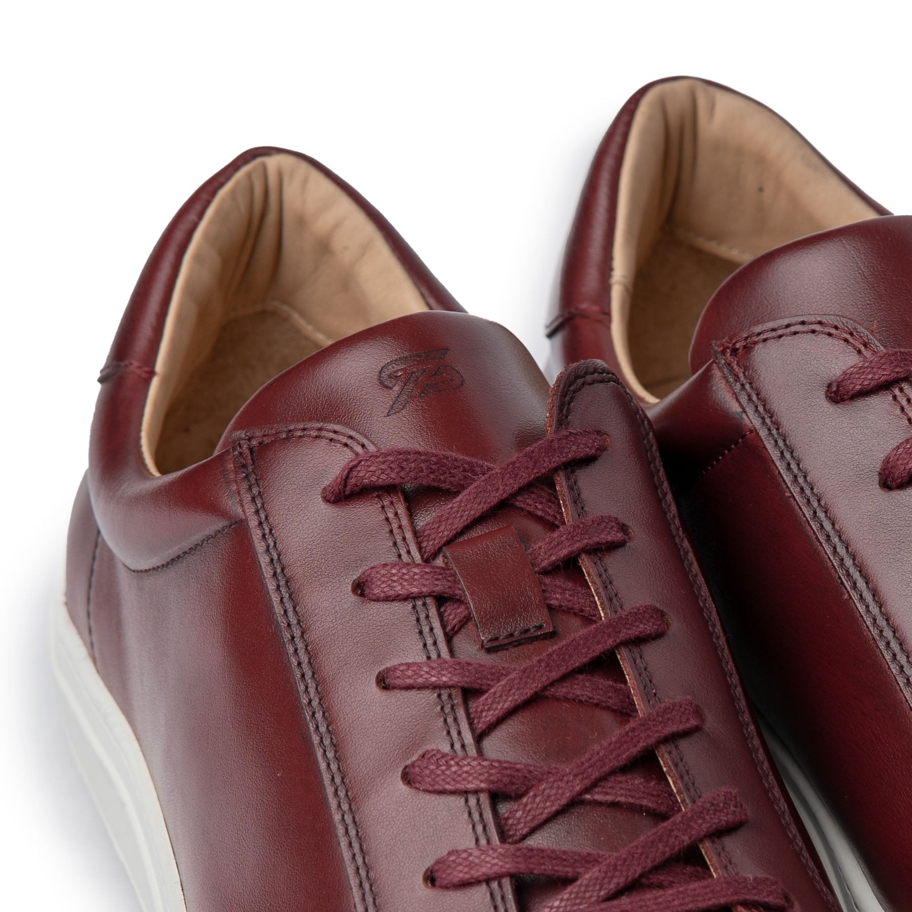 The Vin leather trainers for men in burgundy, handcrafted from full grain calfskin leather upper