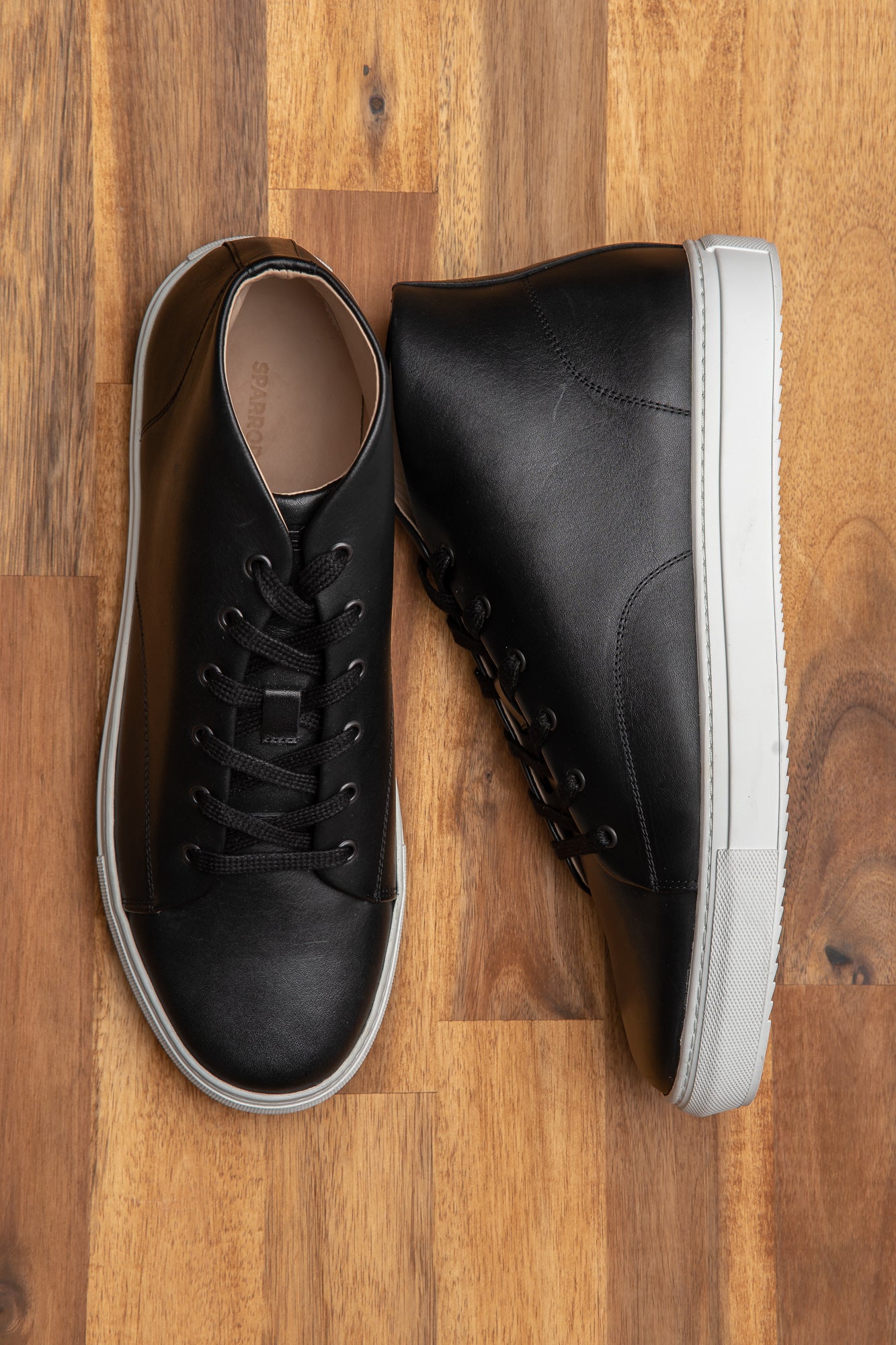 Pair of the Explorer hi-top leather sneakers, showing excellent craftmanship and true to size.