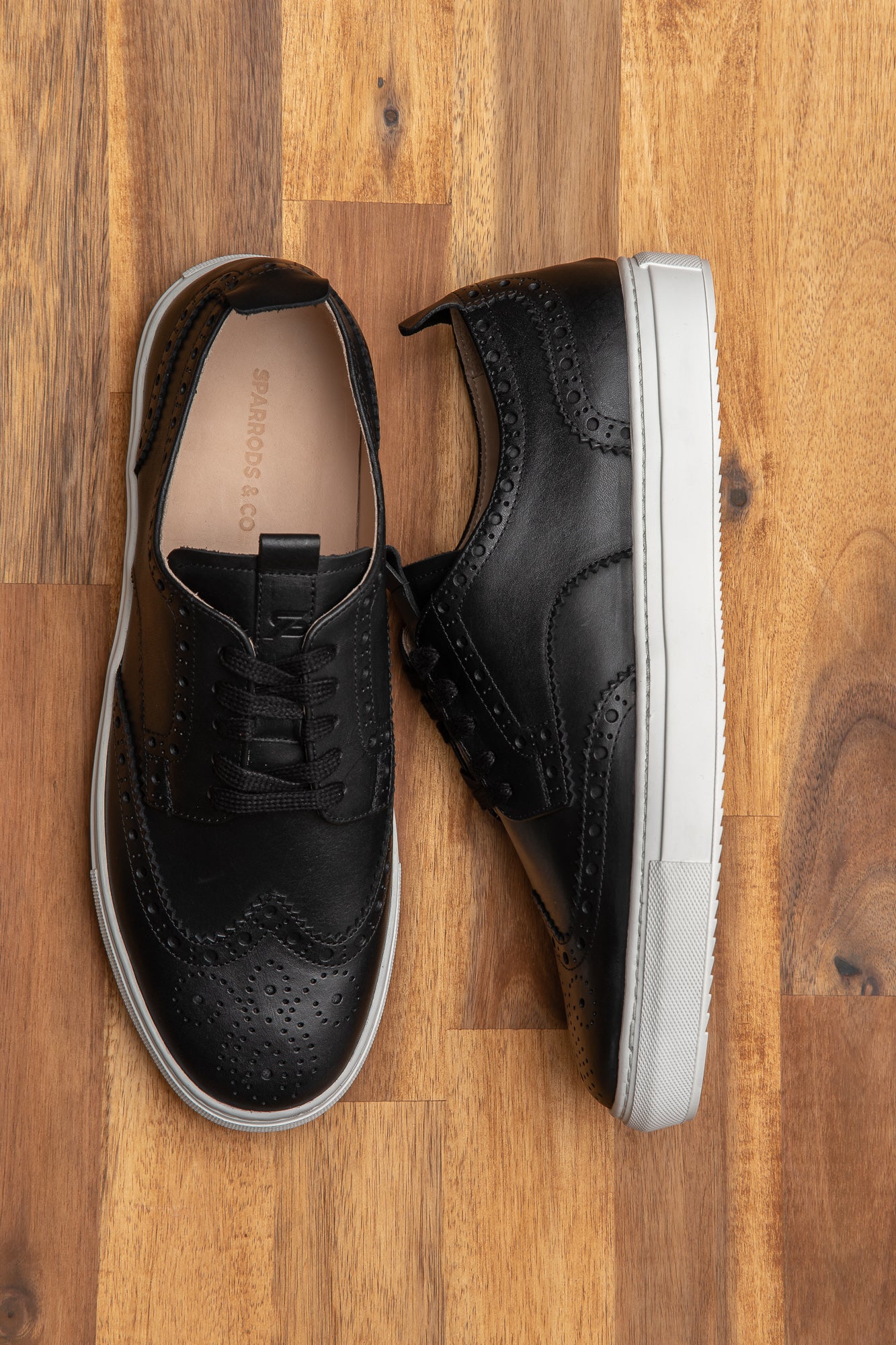 The Alpha mens black casual sneakers for jeans, chinos and shorts