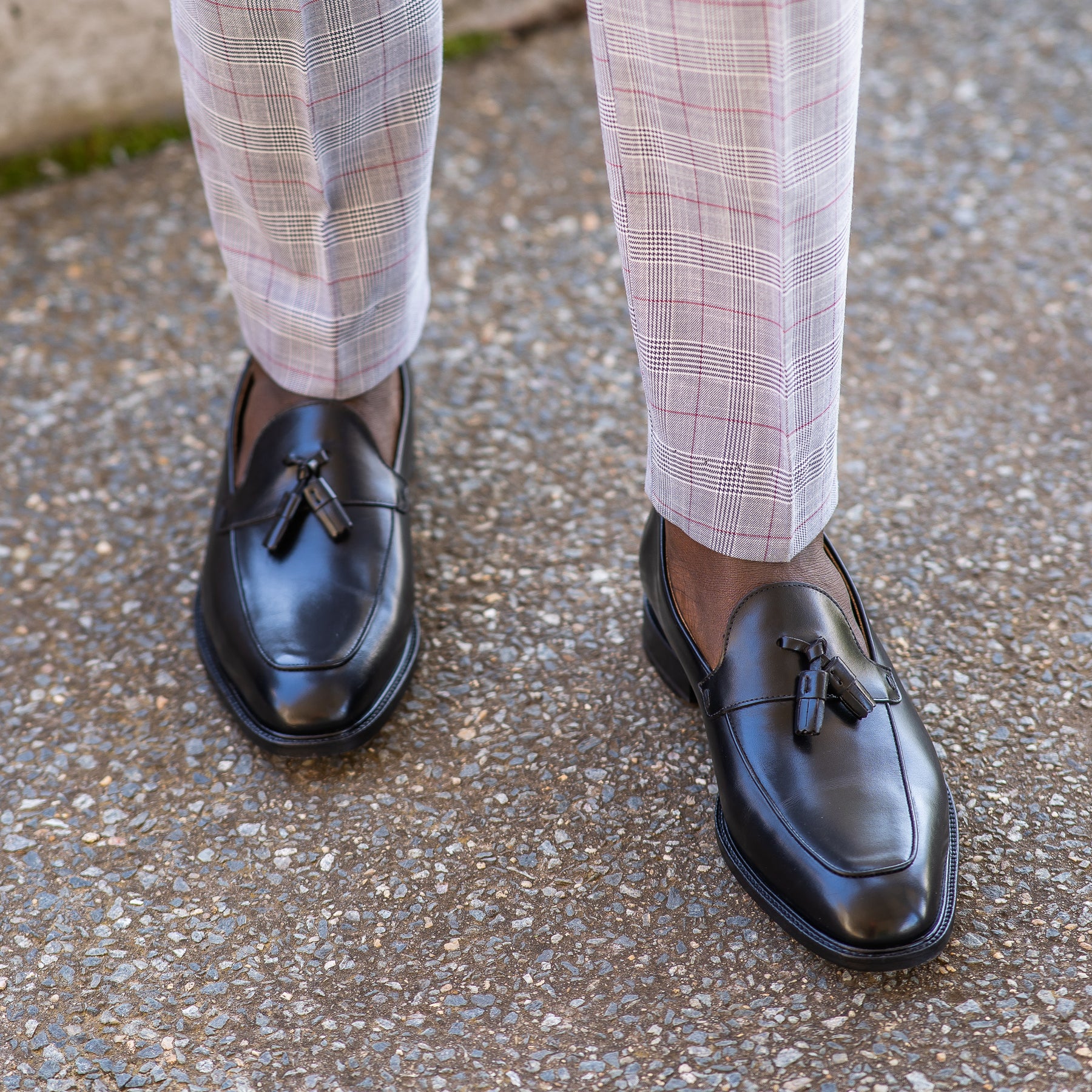 Tassel loafer in black with blake rapid stitch construction  and worn casual outfit